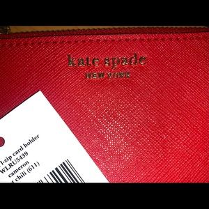 Red Kate Spade card holder wallet.